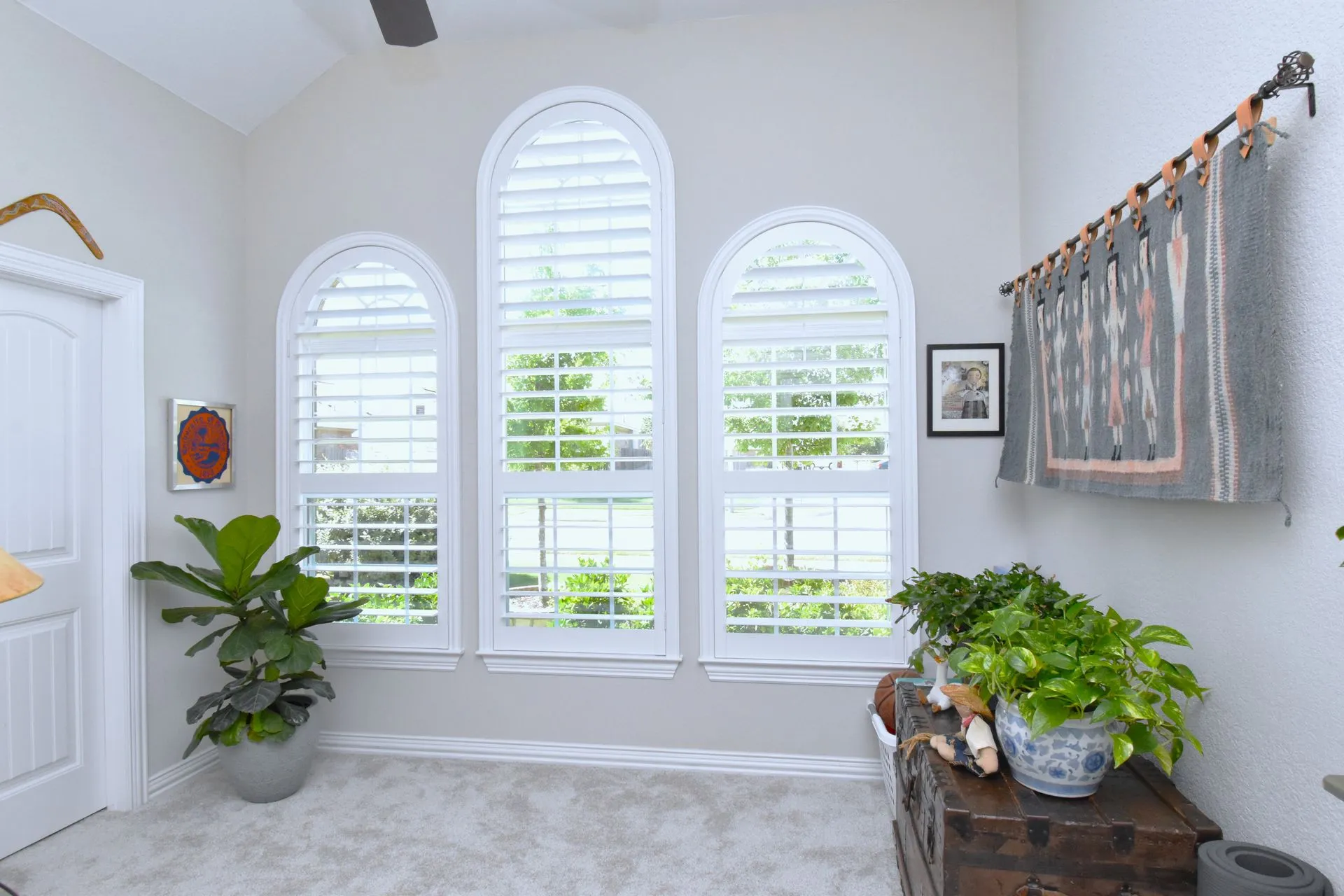 Arched window shutters