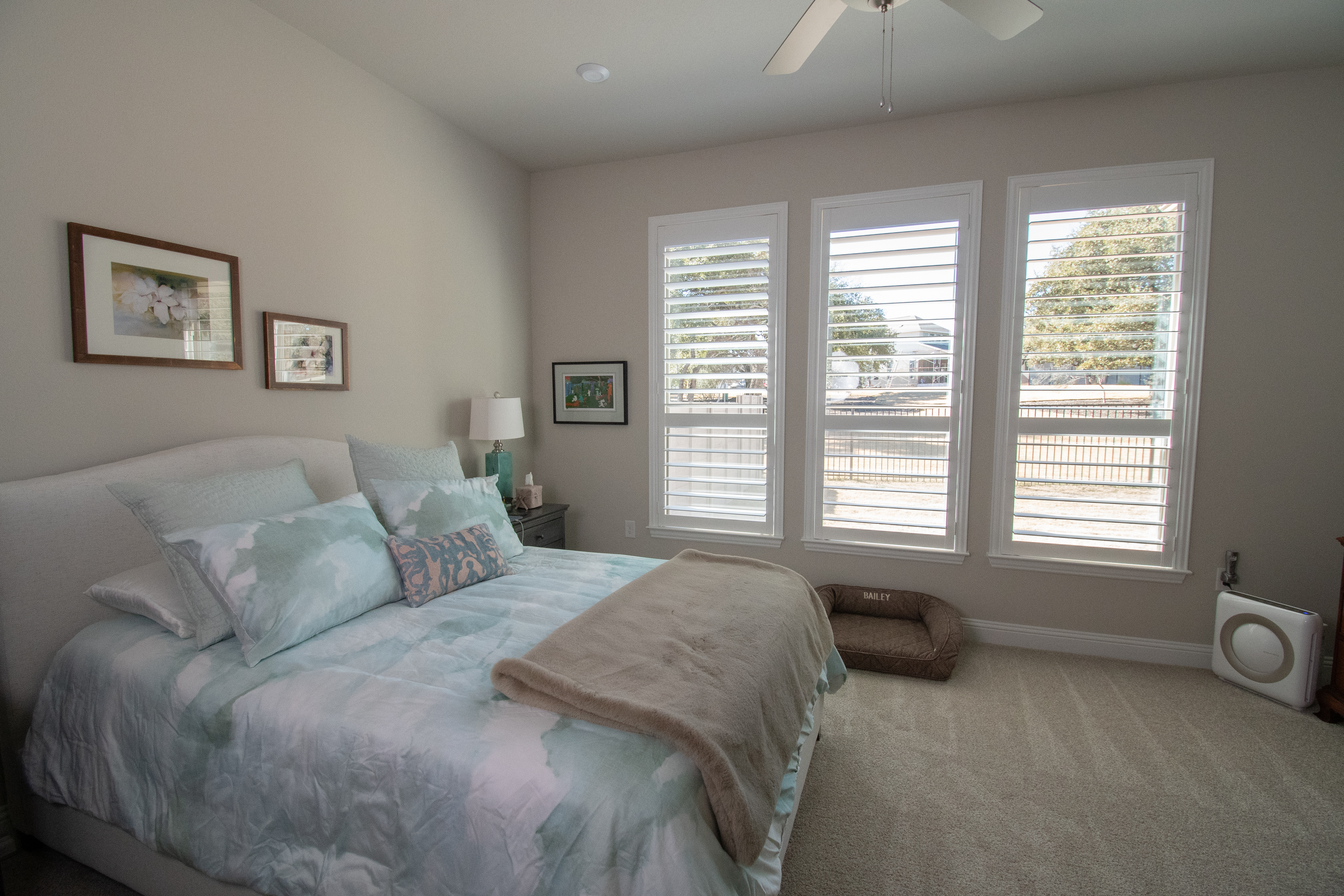 Bedroom white shutters